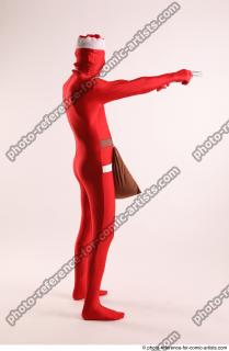 07 2019 01 JOEL ADAMSON CHRISTMAS VILLAIN WITH TWO GUNS